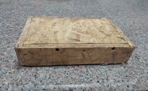 Una caja de madera

Descripción generada automáticamente con confianza baja